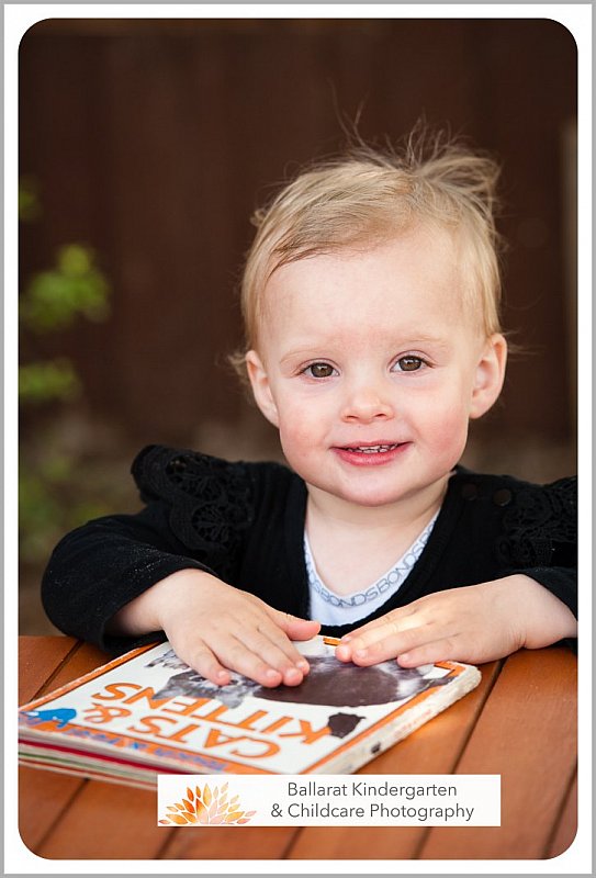 Ballarat Childcare Photography_Girl with cat book.jpg